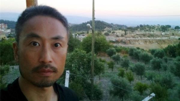 Yasuda, a freelance journalist, was seen in the video reading a message to his family and country