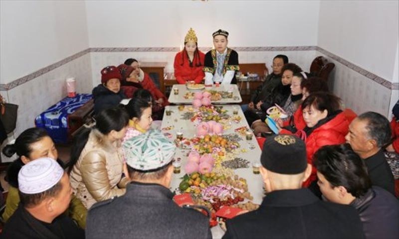 Jian Jian, a Uyghur, marries a Han in January in 2015 in Fengshu, Taoyuan county, Central China's Hunan Province. They had a traditional Uyghur wedding. Photo: Courtesy of Jian Jian