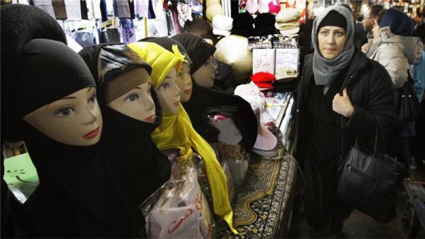 President Hassan Rouhani's government is not strict in enforcing the head covering rule [File: Vahid Salemi