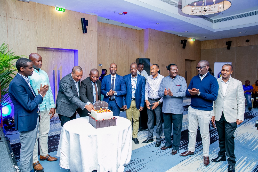 Cutting a cake was among sessions that marked KPA's Kigali liaison office ten-year anniversary in Rwanda. 