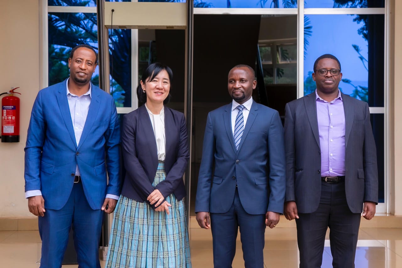 Representatives from relevant institutions posing for a photo after the signing ceremony.