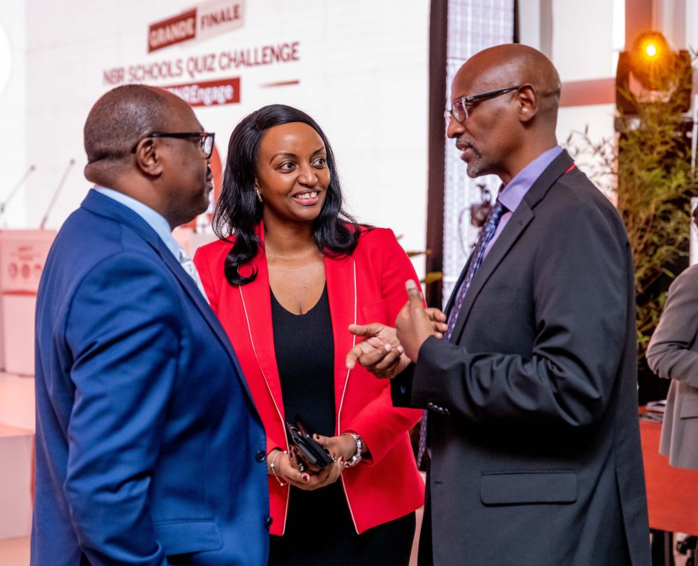 Central Bank Deputy Governor Dr Justin Nsengiyumva, Governor Soraya M. Hakuziyaremye and Minister Joseph Nsengimana chat shortly after NBR School Quiz Challenge in Kigali