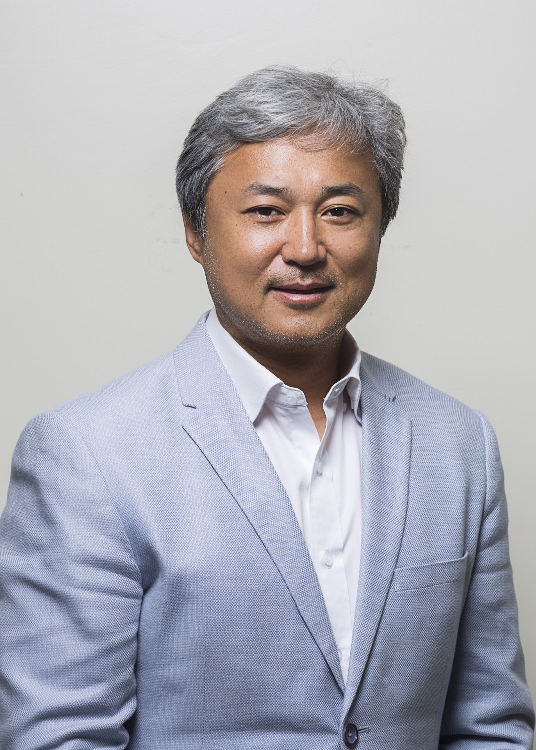 The Chief Executive Officer of AOS, Mr. Seong Woo Kim 