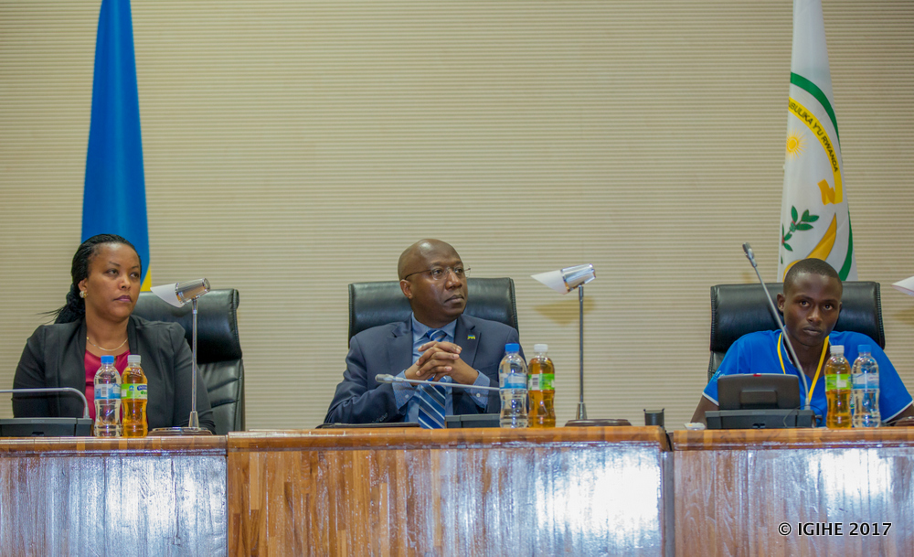 Prime Minister, Dr. Eduard Ngirente (C), Gender and Family Promotion Minister (L) and AngeKarasira, the representative of children forum