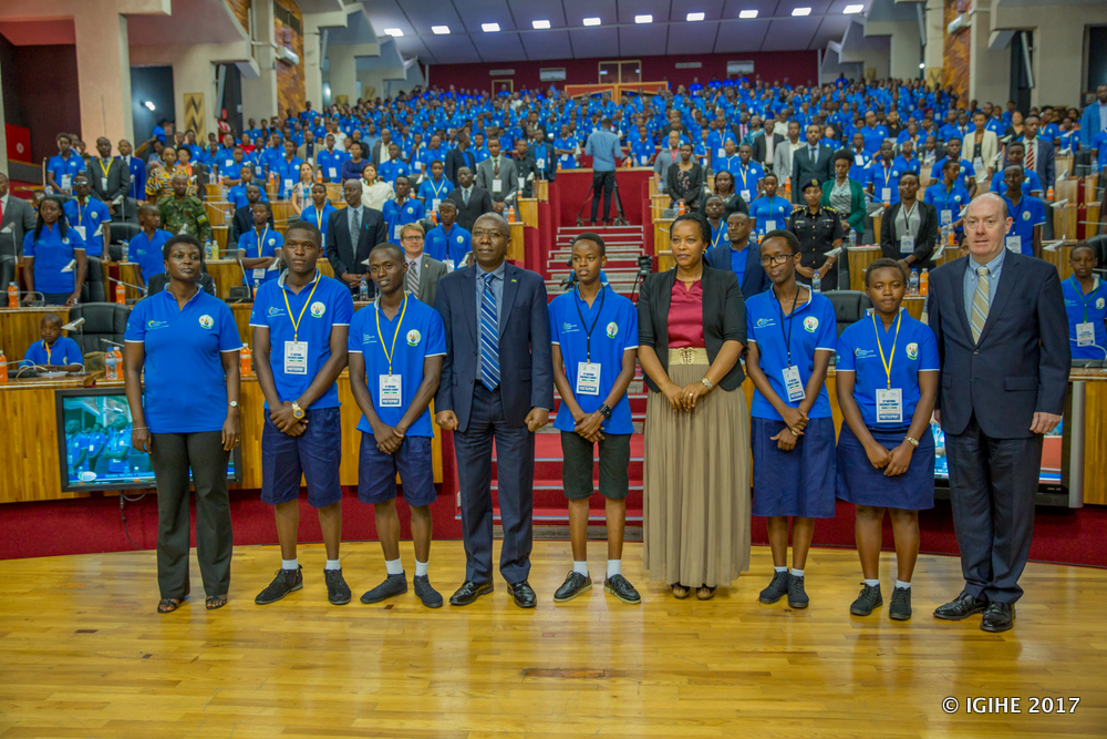 Officials and children pose for a group photo