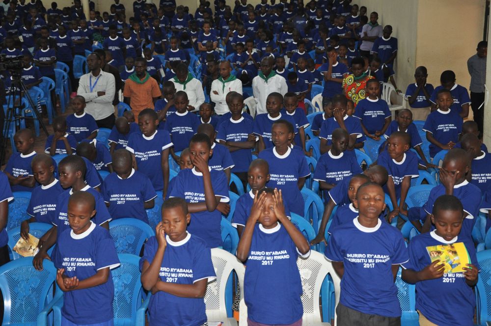 Children during prayers in the camp