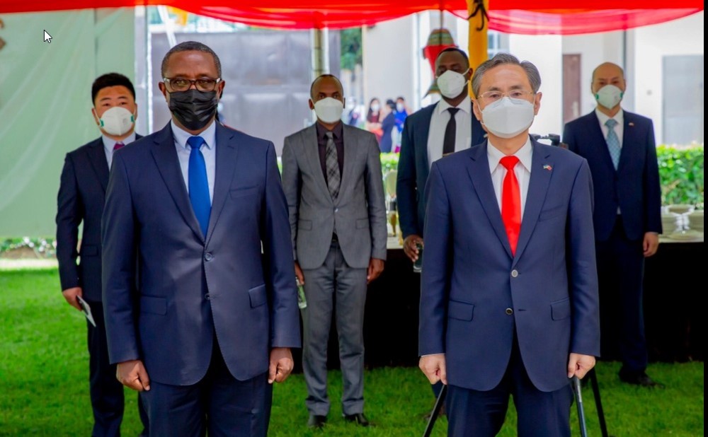 Rwandan Foreign Minister Vincent Biruta (L, Front) and Chinese Ambassador to Rwanda Rao Hongwei (R, Front) attend an event marking the 50th anniversary of the establishment of diplomatic relations between China and Rwanda in Kigali, Rwanda, on Nov. 8, 2021. 