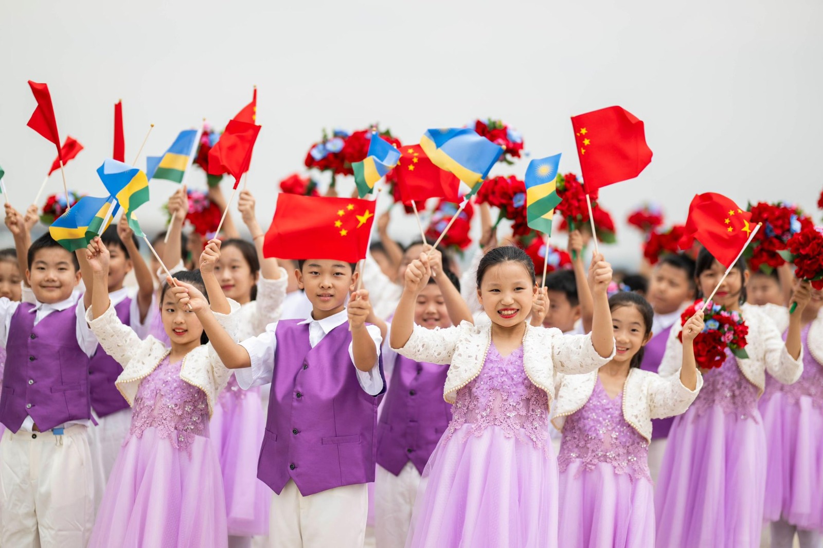 Young Jubilant Chinese children at the opening ceremony of the FOCAC Summit