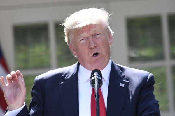 US President Donald Trump announces his decision to withdraw the US from the Paris Climate Accords in the Rose Garden of the White House in Washington, DC, on June 1, 2017.