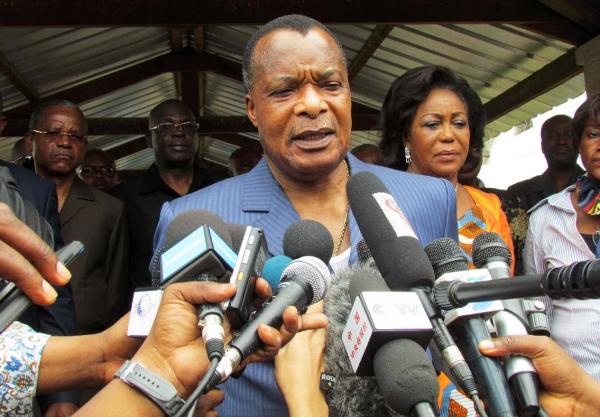 Congolese President Denis Sassou Nguessou talks to the media after voting on the controversial referendum that will allow him to extend his rule on October 25, 2015 in Brazzaville