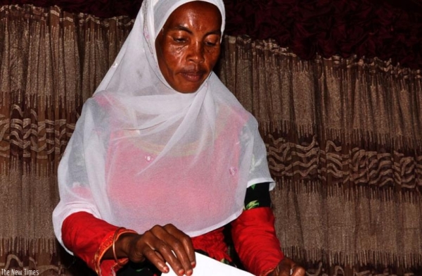 A woman casts her vote in Kicukiro District during a past electoral process