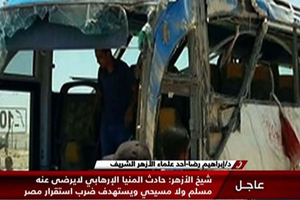 An image grab taken from Egypt's state-run Nile News TV channel on May 26, 2017 shows the remains of a bus that was attacked in Cairo, killing dozens people, according to state media and the health ministry.