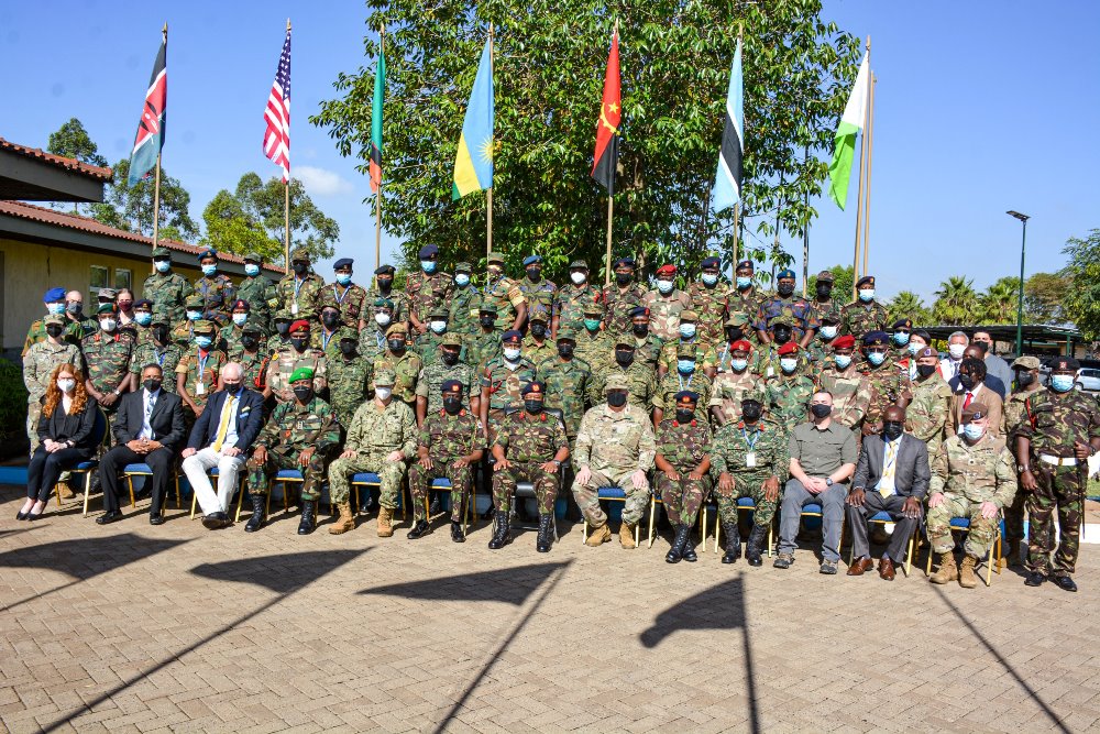 Military officers from different countries attending the exercise in a group photo.  