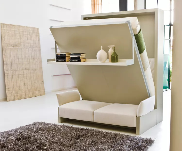 Hidden away in a cute little three-seat sofa, this queen-sized murphy bed disappears seamlessly into the decor and transforms with hardly any hassle.