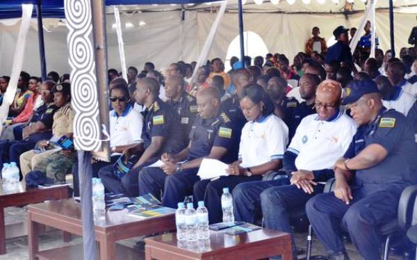 IGP Emmanuel K. Gasana and City of Kigali Mayor Monique Mukaruliza (C) together with other government officials during the official launch of Police week 2016. (Courtesy)