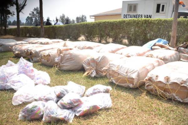 Seized boxes of banned gin concealed in sacks.