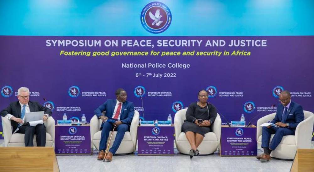 Panelists speaking at the official opening of the symposium.