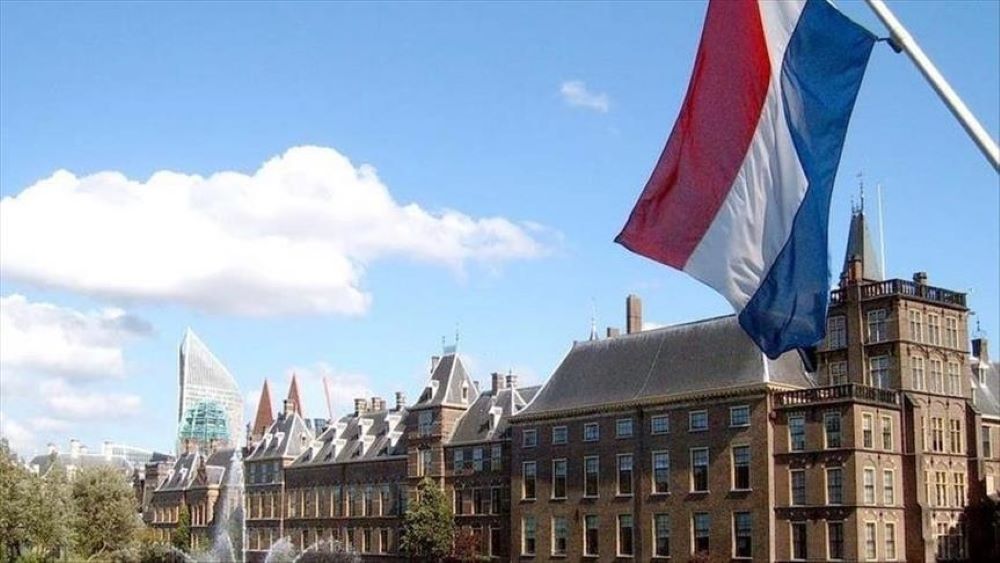 Knife-carrying intruder has prompted temporary lockdown at Dutch Parliament.
