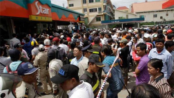 Hundreds gathered outside the store Kem Ley was killed as many of them mourned 