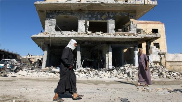 Air strikes have levelled residential buildings in eastern Aleppo, locals say