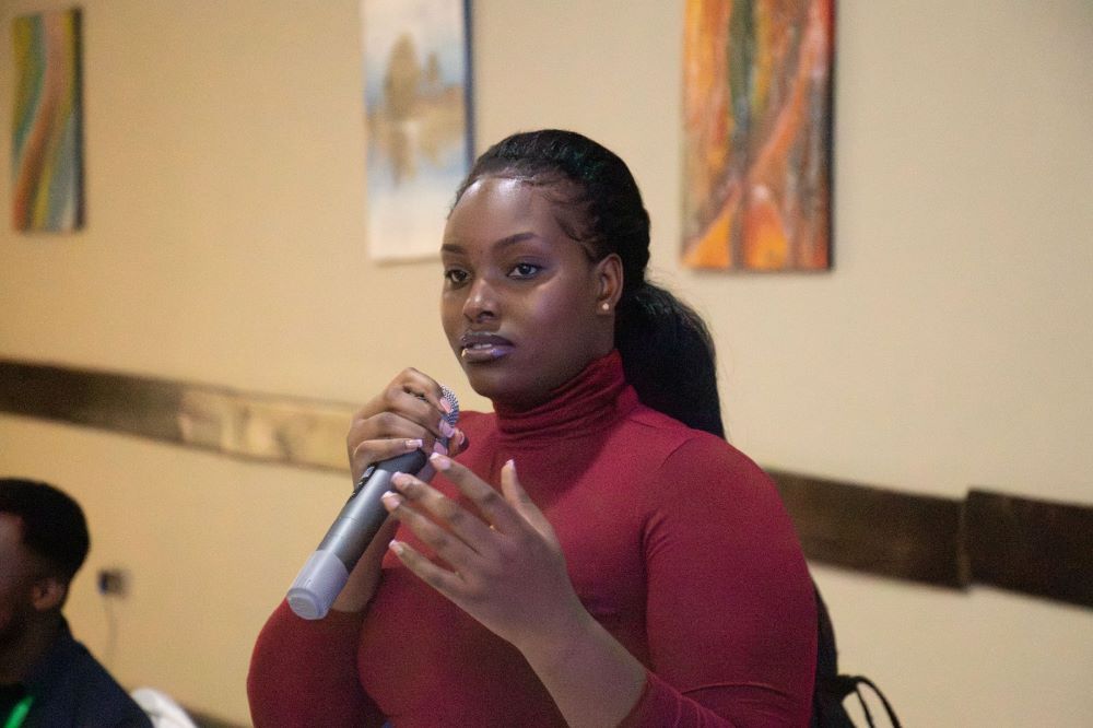 Secretary-General of FALAS Ampumuza Dawn Abigail sharing ideas at the conference.  