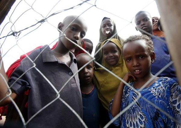 Refugees at Dadaab Refugee camp on December 4, 2013. President Uhuru Kenyatta told a delegation of diplomats from the UN’s most powerful body, in Nairobi, that the camp, the world’s largest by population, would have to be closed to save the country from security hazards.