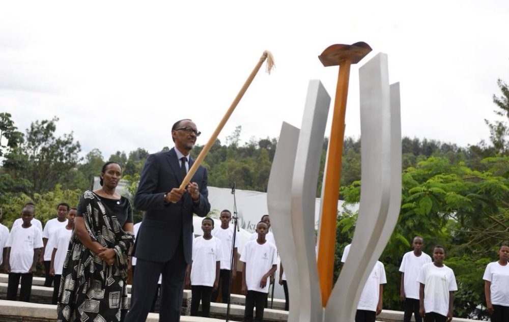 President Kagame lits a light of frame symbolizing the hope of the future.