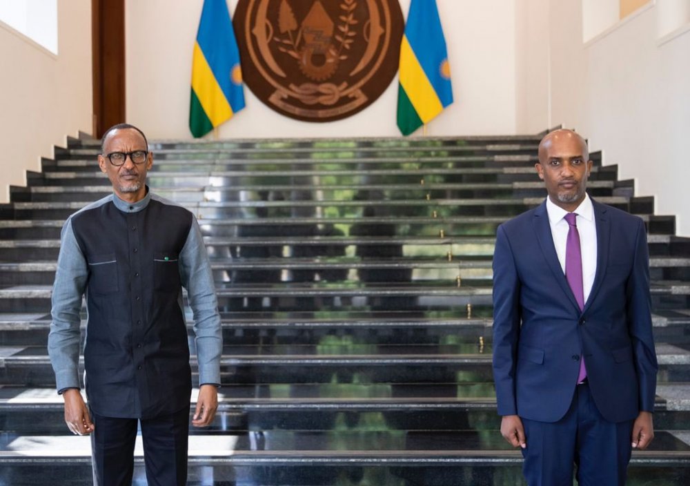 President Paul Kagame with the new Minister of Justice, Dr. Ugirashebuja.