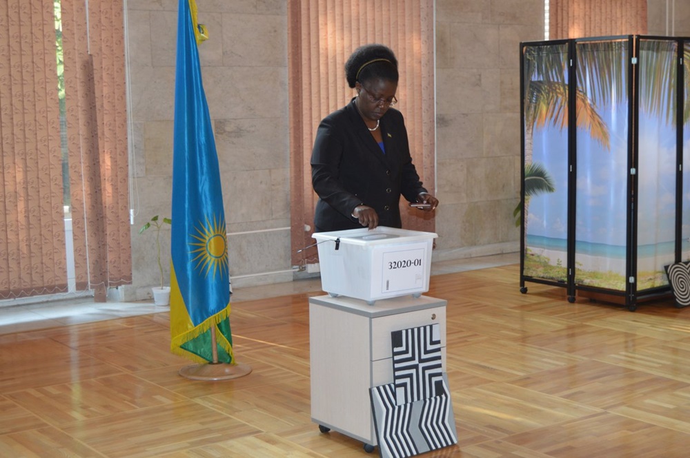 Ambassador to Russia, Jeanne D'Arc Mujawamariya, casts vote.