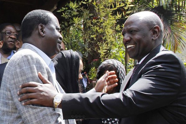 Opposition leader Raila Odinga (left) and Deputy President William Ruto. Mr Odinga has said ICC decision to drop crimes against humanity charges against Kenyan leaders spells doom for global war on impunity.