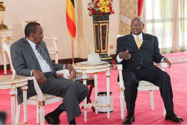 President Uhuru Kenyatta (left) meets Uganda President Yoweri Museveni at Entebbe State House, Uganda, on August 9, 2015. Talks between Kenya and Uganda on the pipeline route have taken over a month with President Kenyatta and President Museveni meeting in Nairobi last month.