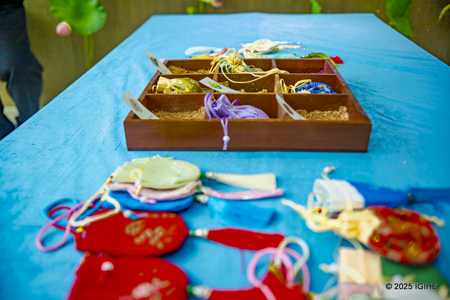 Doctors at Beijing Massage Hospital wrap medicinal herbs following traditional methods of prescription preparation.