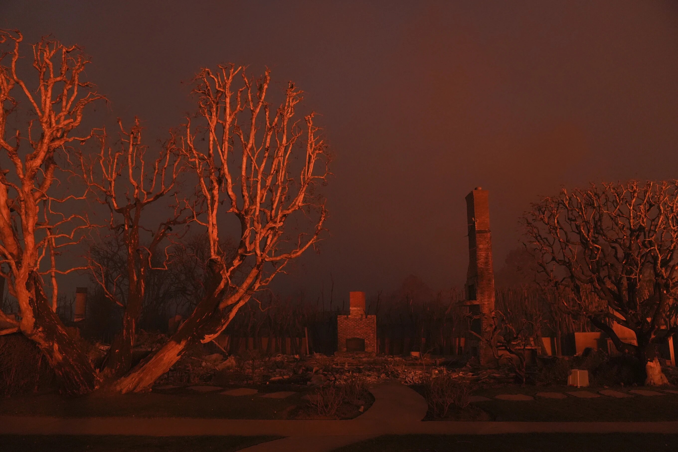 The ruins of a burned property in the Pacific Palisades neighborhood of Los Angeles, in the aftermath of the Palisades Fire, Thursday, January 9, 2025.