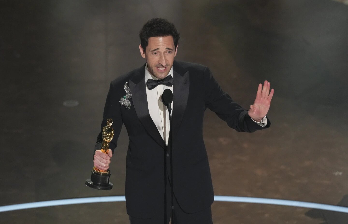 Adrien Brody accepts the award for the best Performance by an actor in a leading role for "The Brutalist" during the Oscars on Sunday, March 2, 2025, at the Dolby Theatre in Los Angeles.