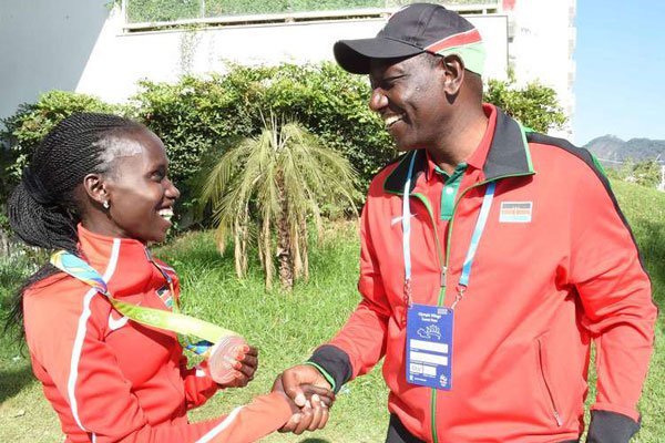 Deputy President William Ruto congratulates Silver medallist Vivian Cheruiyot after the Women's 10,000m in Rio, Brazil. Mr Ruto who had visited the athletes at the Olympic Village in Rio appreciated and encouraged them for their efforts on August 14, 2016.