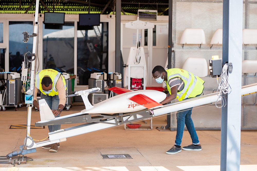Zipline staff taking guests through the process of flying drones.  