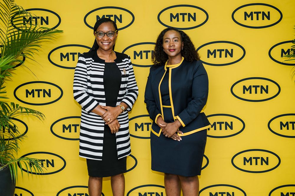 The Minister of Gender and Family Promotion, Prof Bayisenge Jeannette (left) with MTN CEO at the event. 