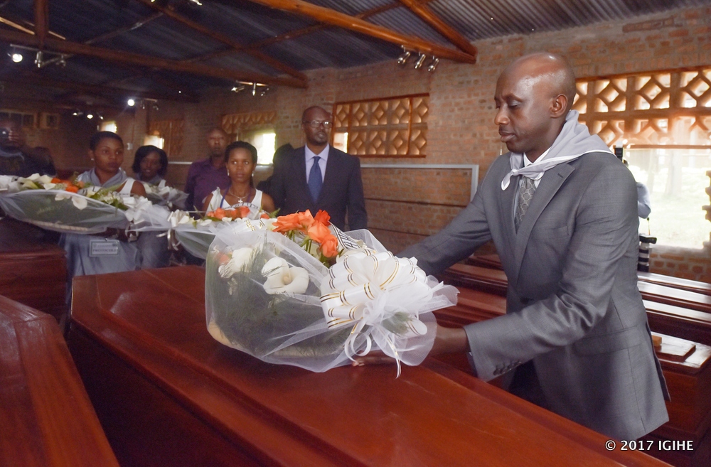 The Minister of Local Government, Francis Kaboneka laying wreaths at Ntarama memorial yesterday.