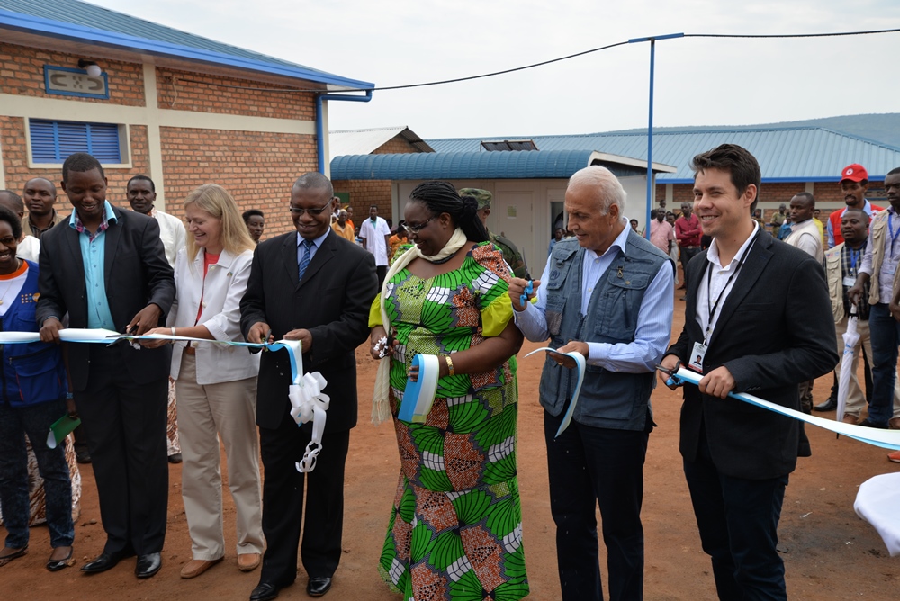The Minister of Disaster Management and Refugees Hon. MukantabanaSeraphine and UN High Commissioner for Refugees (UNHCR) Representative Dr. Saber Azam with other officials during the inauguration of health facilities in Mahama camp on Thursday.  