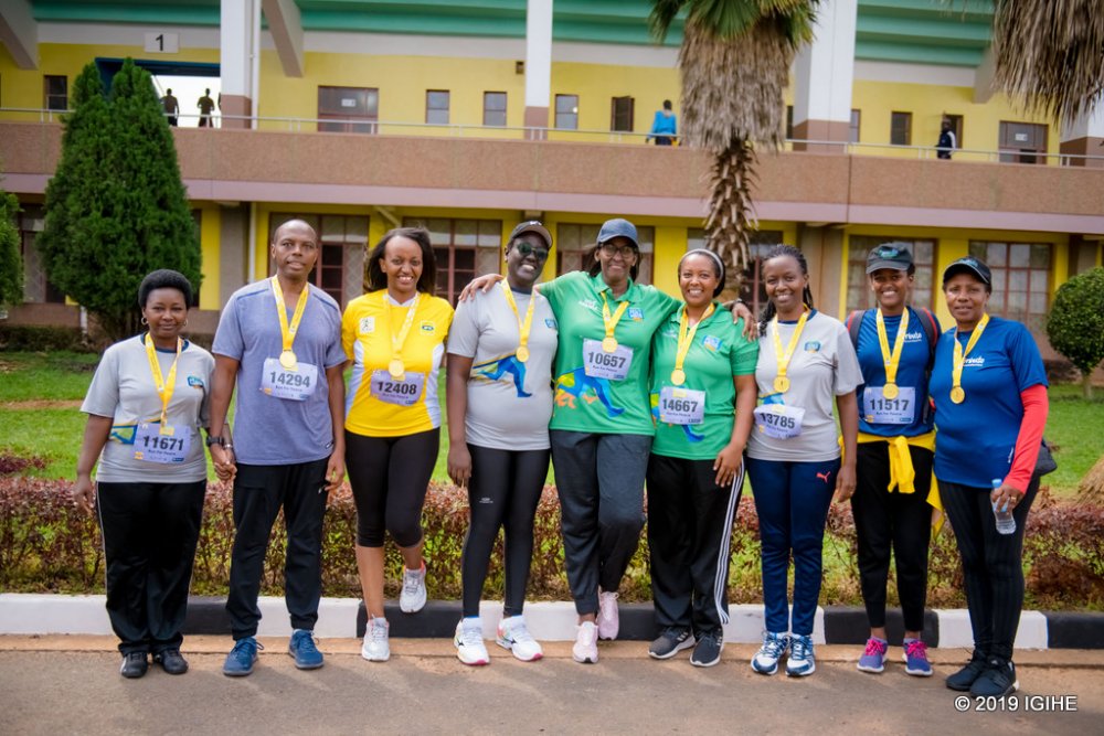 MRS. Kagame on a picture with other leader who were present in this Marathon Run For Peace. from the left: the Cabinet Minister of Gender and Family Promotion: , Nyirahabimana Solina; Chief Executive Officer of the Rwanda Mines, Petroleum & Gas Board, Francis Gatare; Minister of Trade and Industry, Soraya Hakuziyaremye; the Minister of Cabinet Affairs, in the Office of the Prime Minister, Kayisire Marie Solange; the cabinet minister at the Ministry of Sports and Culture,Nyirasafari Espérance; the mayor of kigali city, Rwakazina Marie Chantal; Director General of Imbuto Foundation, Umutoni Sandrine the First Lady's advisor Jeannette Kagame, Radegonde Ndejuru