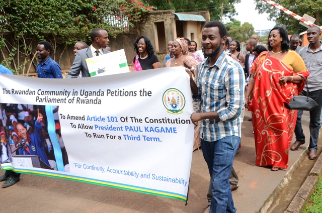 Members of the Rwandan community in Uganda march to the Rwanda High Commission on Monday to present their petition requesting the Rwandan parliament to change article 101 to allow President Paul Kagame to stand again in 2017.