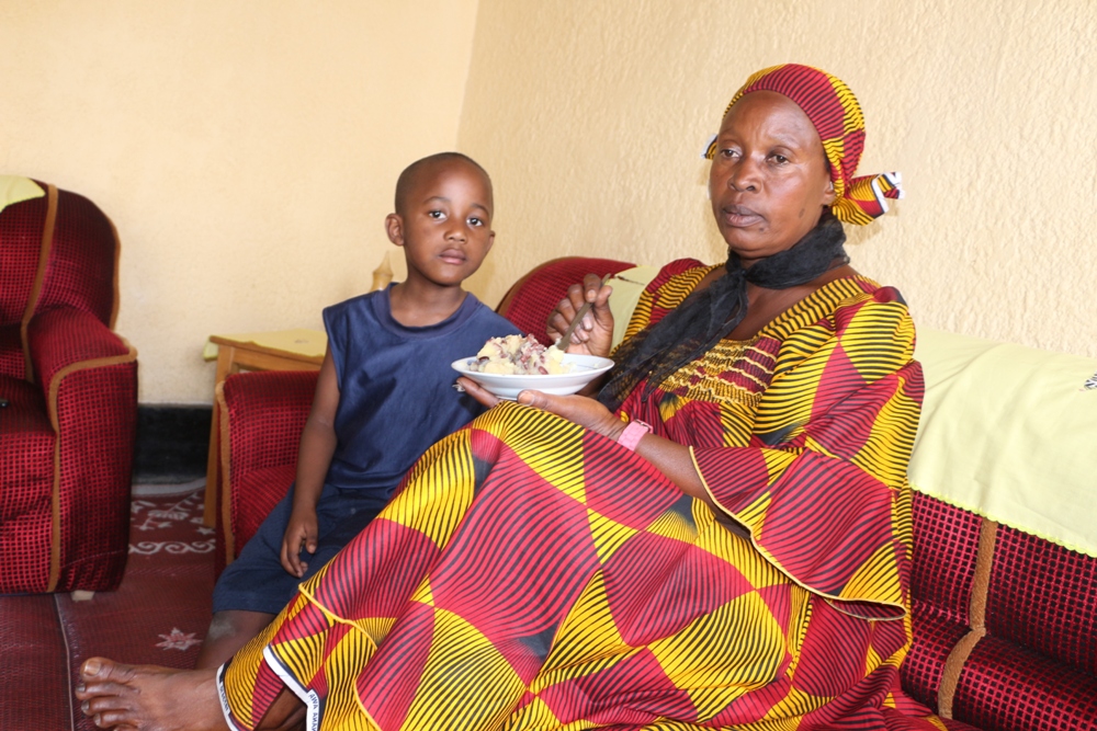 Nzabamwita with fostered child