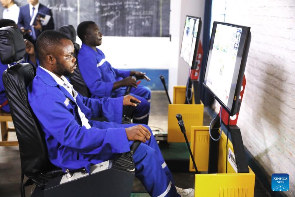 Trainees operate a simulator at the Chinese-built Forever TVET Institute in Kigali, Rwanda, on July 8, 2025. (Photo by Huang Wanqing/Xinhua)