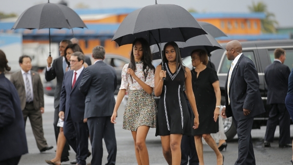 Obama arrived with his wife and two daughters