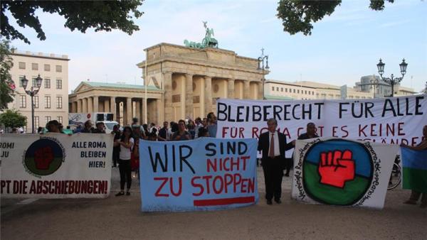 Protesters gather in Berlin against laws that restrict asylum seekers from Western Balkans nations