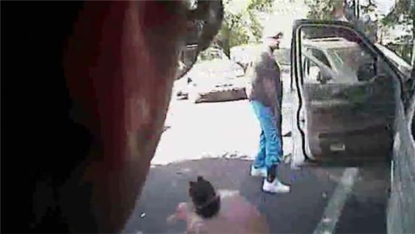 Keith Scott looks over to police just before he was shot four times