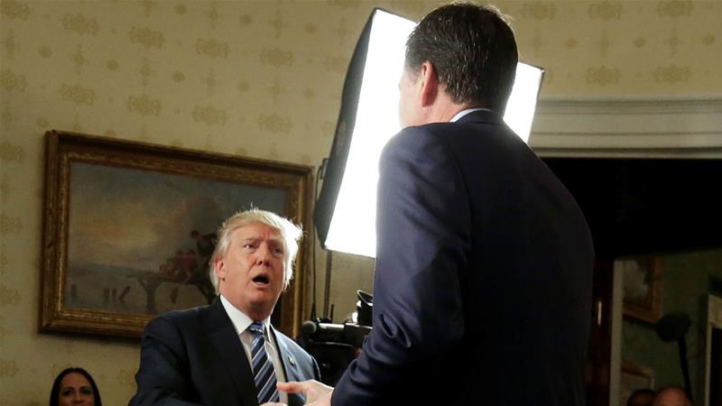President Trump greets former FBI director James Comey at the White House in January
