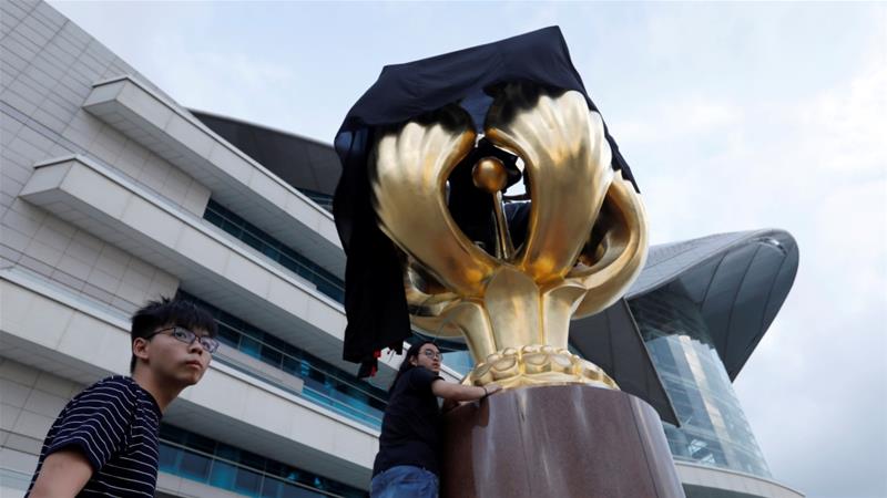 The statue symbolises Hong Kong's return to China by Britain
