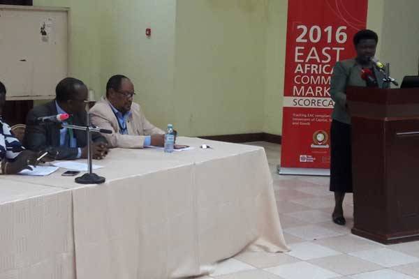 EAC Deputy Secretary-General Jesca Eriyo addresses participants during the launch of the 2016 East African Community Common Market Scorecard in Kampala, Uganda. The report shows EAC countries are yet to fully implement the common market protocols which were meant to boost the region’s trade.