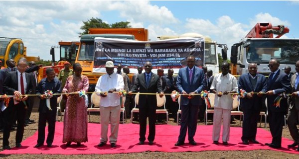 The Chairman of the East African Community (EAC), Tanzanian President John Magufuli (centre) and other East African Heads of State jointly cut a ribbon to inaugurate the construction of a 234.3-kilometre Arusha-Holili/Taveta-Voi Road at a ceremony held yesterday.